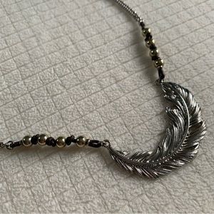 Jessica Simpson feather pendant long necklace